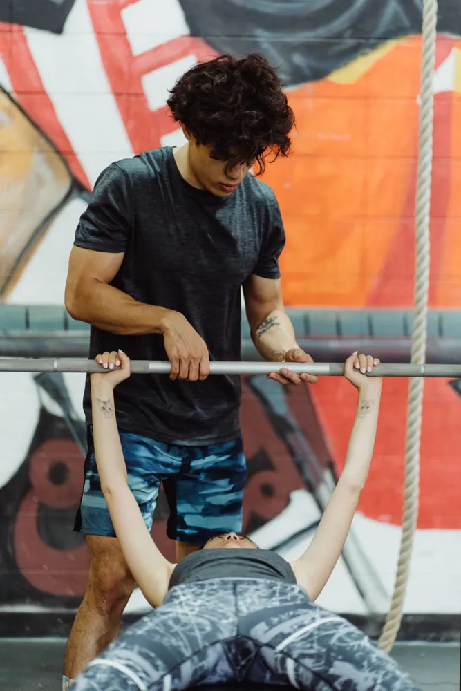 A one-to-one strength training session with a coach